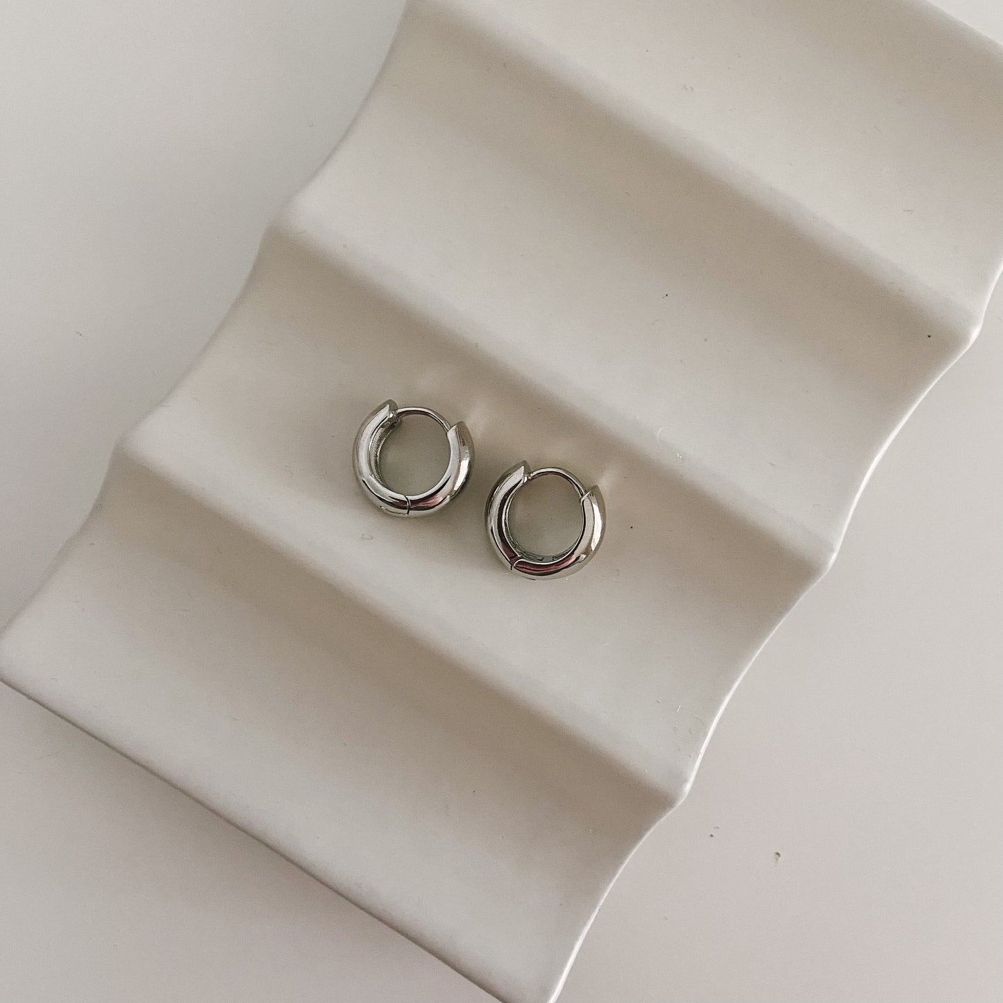 SJ silver chunky huggies — earrings